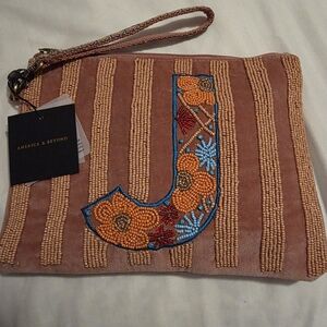 America & Beyond Tan Beaded Wristlet